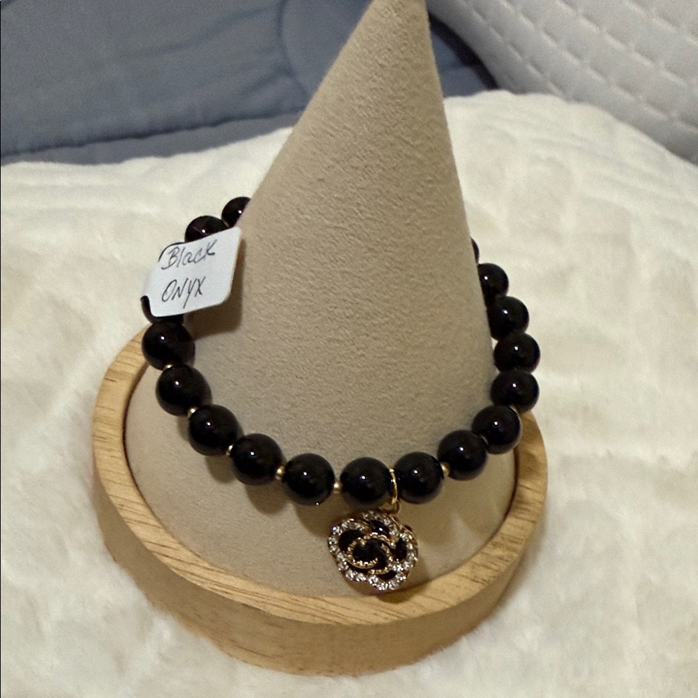 Elegant Black Onyx Bracelet with Gold Tone Accents